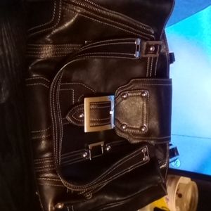 Maximum black leather handbag